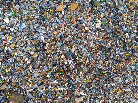 Colorful Polished glass pieces at Glass Beach, California close up photograph.