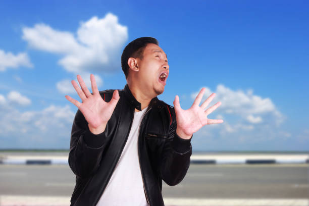 Asian Man With Hands Up Surrender Stock Photo - Download Image Now - Hand  Raised, Displeased, Adult - iStock