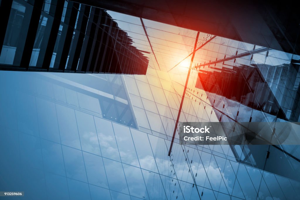 Skyscraper or modern building in the city with sunlight Abstract Stock Photo