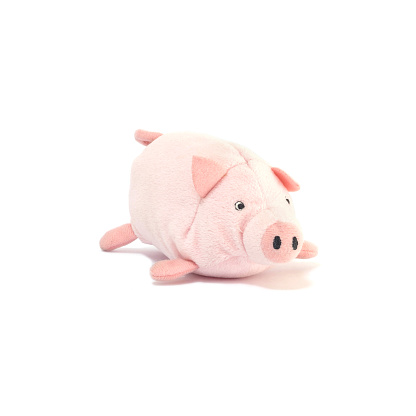 Closeup cute pink pig doll isolated on white background