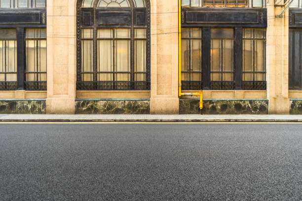 istock sidewalk by street wall & window 913271284