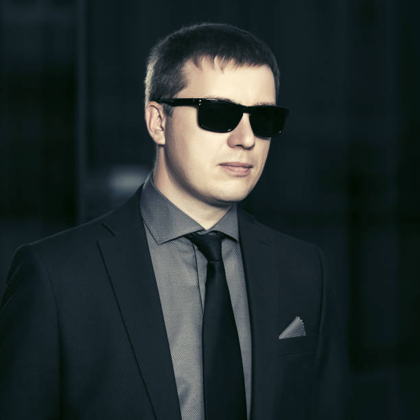 istock Young handsome business man in sunglasses 913271286
