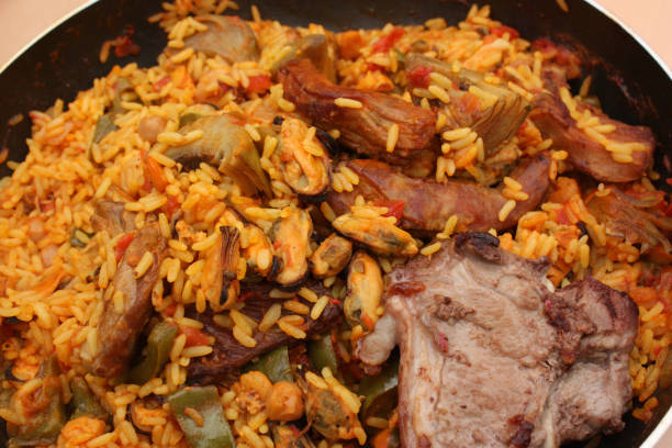 istock Paella with seafood and lamb meat 913272394
