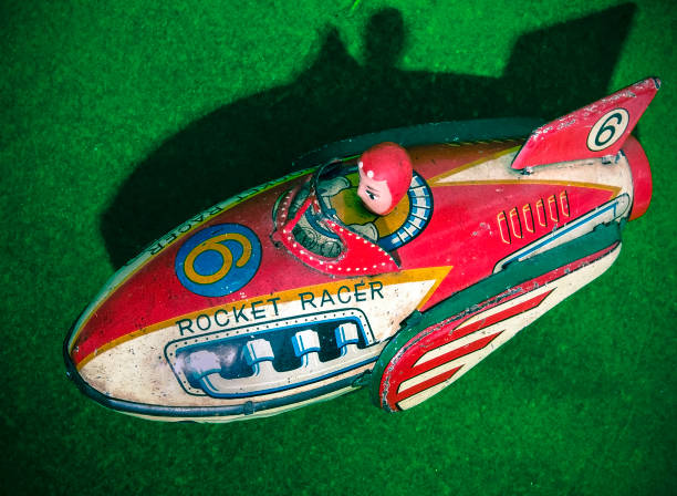 istock retro rocket tin toy close up on green felt 913272472