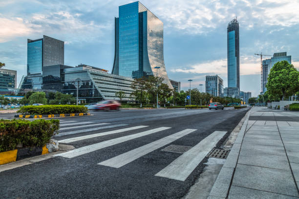 istock City empty road with modern buildings background 913272510