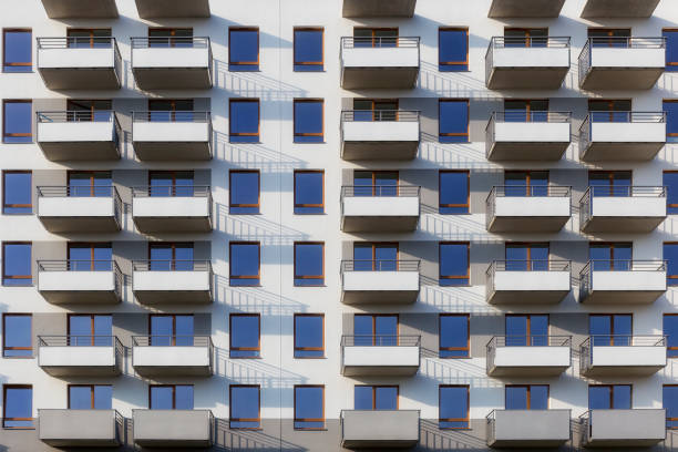 istock Rows of balconies in modern apartment building 913272682