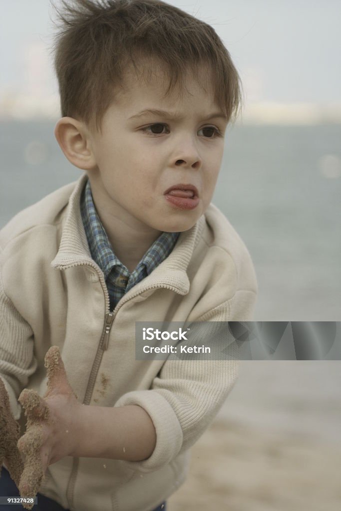 A criança - Foto de stock de Areia royalty-free