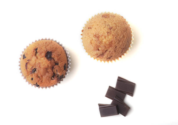 istock Homemade muffin with raisins and chocolate cupcake. selective focus 913278694