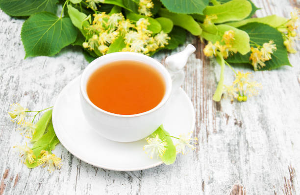 istock cup of herbal tea with linden flowers 913280668