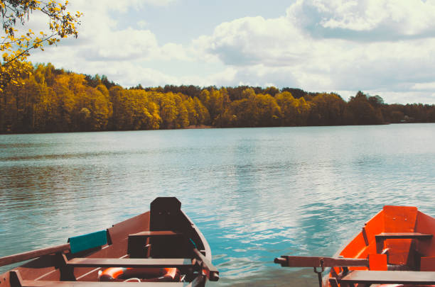 Two boats on a lake stock photo