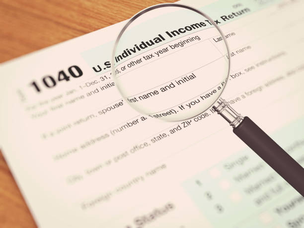 istock Tax form payment desk top view 913284046