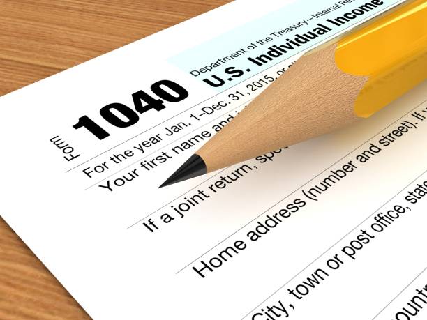 istock Tax form payment desk top view 913284330