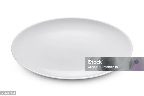 Simple White Circular Porcelain Plate With Clipping Path Stock Photo - Download Image Now