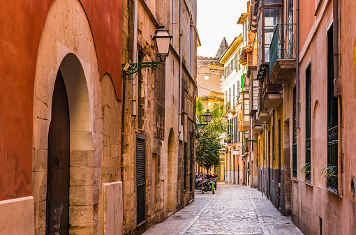 View of narrow street at the old town of Palma de Mallorca, Spain Balearic Isalnds