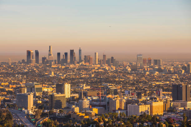 istock Traffic in Los Angeles freeway to downtown sunset 913295702