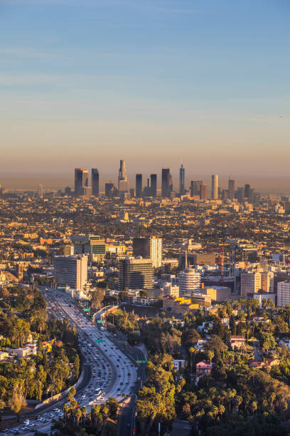 istock Traffic in Los Angeles freeway to downtown sunset 913295718