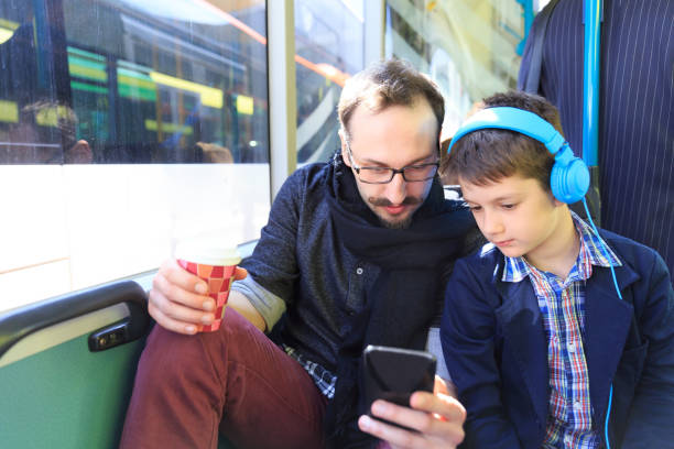 istock Father and son traveling with bus 913296186