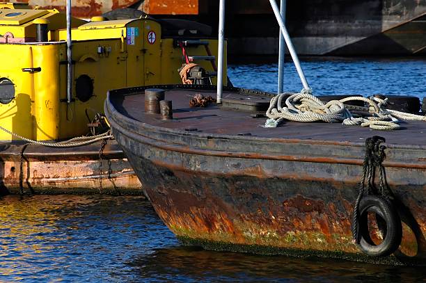 istock detail of an old & rusty cargo ship in harbour 91329743