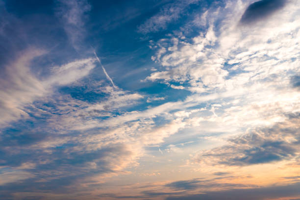 Beautiful sky with clouds and sunshine at sunset for any purpose
