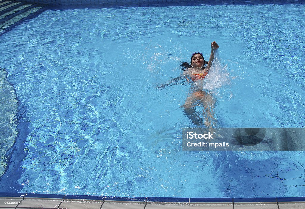 Swimming in the  pool  Active Lifestyle Stock Photo