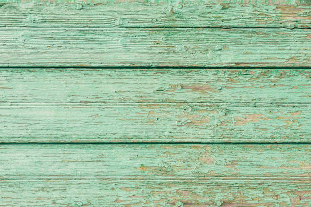 istock Old green paint wood background 913300998