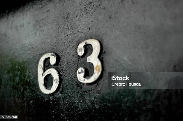 Foto de Number 63 On Black Door e mais fotos de stock de Conceito - Conceito, Cor Preta, Desfocado - Foco