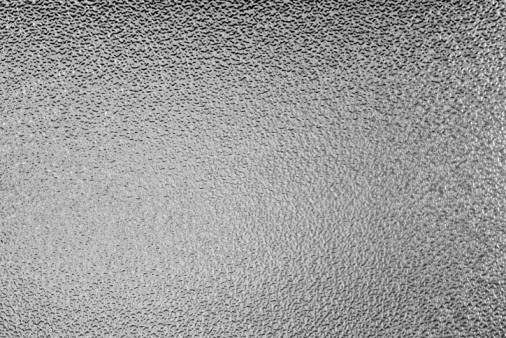 Pebbly [ ] de fondo gris vidrio photo