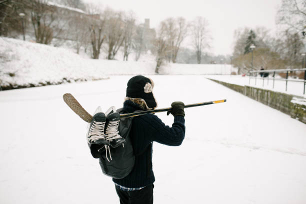 Man with Hockey Gear in Winter