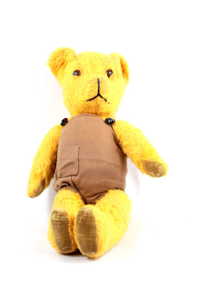istock Vintage Antique Toy Teddy on White Background 913312454
