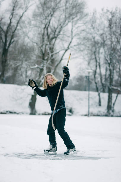 istock Hockey Player on Frozen Lake 913312456