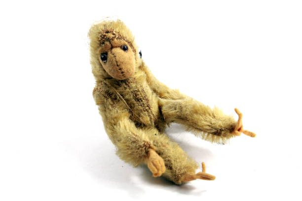 istock Vintage Antique Toy Teddy Monkey on White Background 913312534