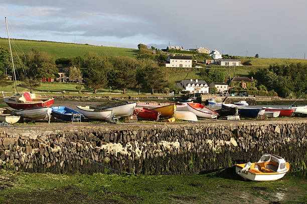 Small boats on  pier Ring, Near Clonakilty South West Ireland  county cork stock pictures, royalty-free photos & images