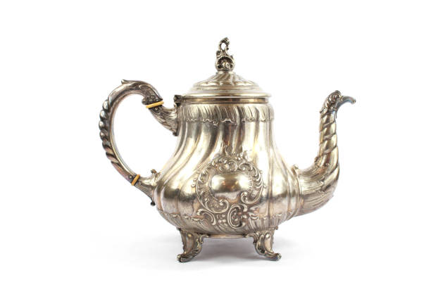 istock Silver Metal Ornate Tea Pot on White Background 913314684