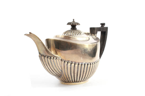 Silver Metal Ornate Tea Pot on White Background stock photo