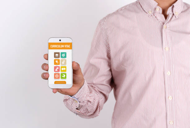 istock Man showing smartphone Curriculum Vitae on screen 913316234