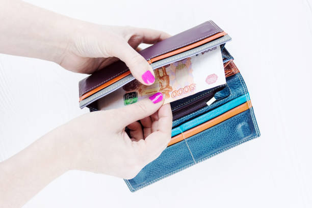 istock purse with money 913316858