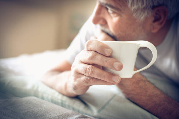 istock Cup of coffee in hand. 913319864