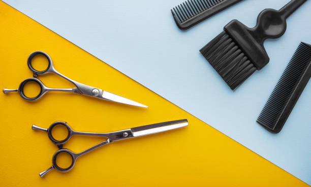 istock combs and hairdresser tools top view 913320190