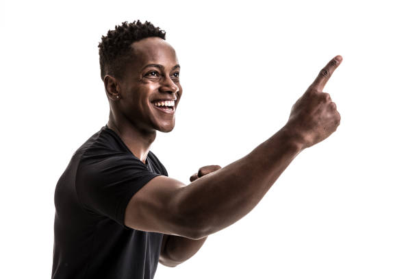 istock Afro male athlete / fan celebrating on white background 913323214