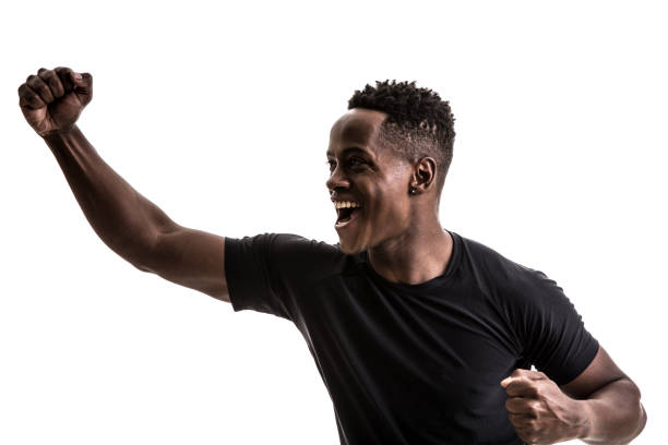 istock Afro male athlete / fan celebrating on white background 913323228