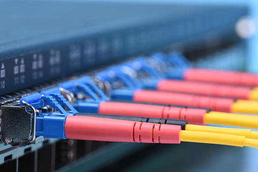 Switch with fiber optic cables in data center