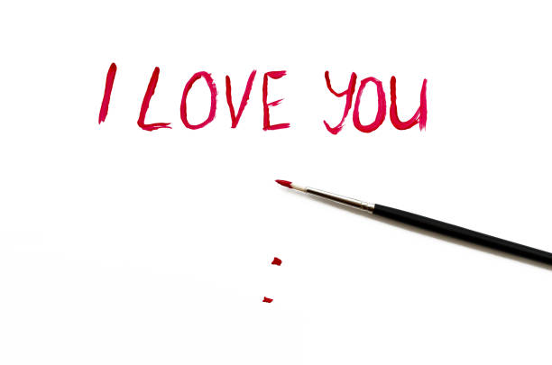 istock i love you  brush painted on white background 913331072