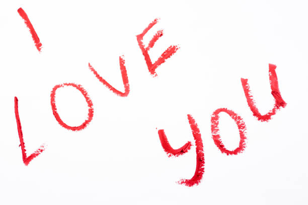 istock i love you  lipstick painted on white background 913331110