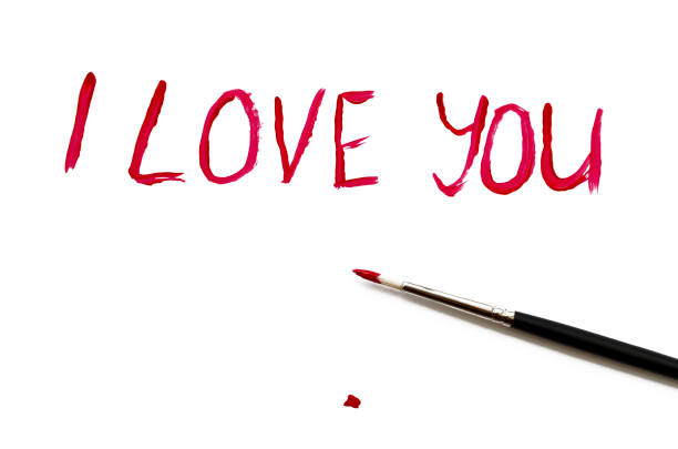 istock i love you  brush painted on white background 913331122
