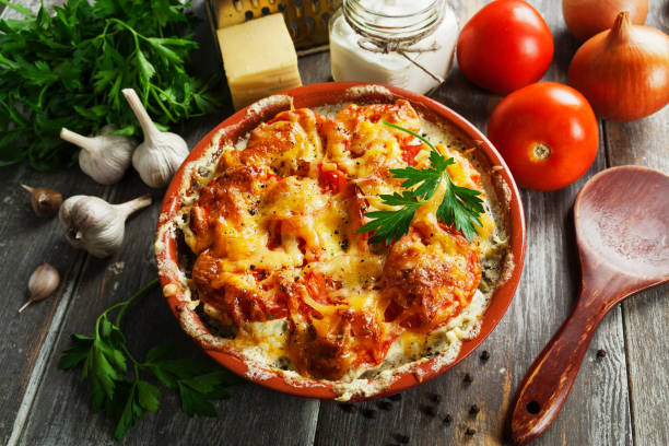 istock Fish baked with tomatoes, sour cream and cheese 913336030