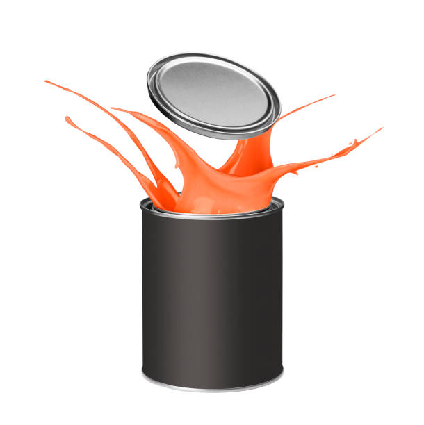 istock Orange paint splashing out of paint can 913336128