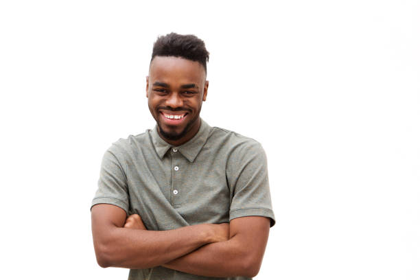 istock happy young african american man smiling against isolated white background 913338214