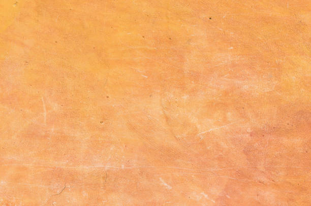 mediterranean wandbeschaffenheit putz gemalt - orange wall textured paint stock-fotos und bilder