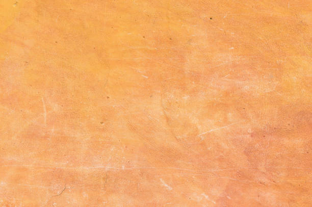 méditerranée peint texture plâtre mur - orange wall photos et images de collection