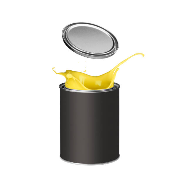 istock Yellow paint splashing out of paint can 913339328